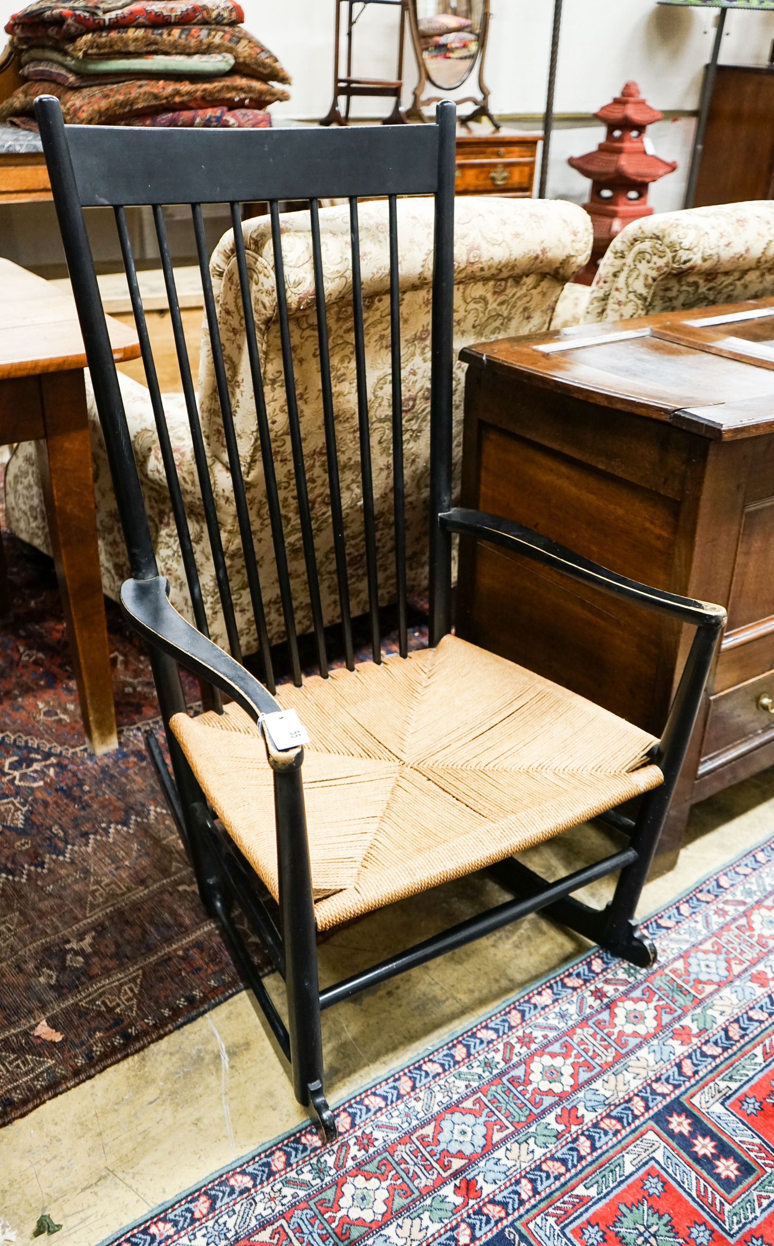 Hans J Wegner for Fredericia J18 FDB Danish rocking chair. 1960's ebonised beech. Original paper cord seat, width 63cm, depth 56cm, height 112cm